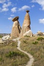 Volcanic rock formations known as fairy chimneys and extreme terrain of Cappadocia, Turkey Royalty Free Stock Photo