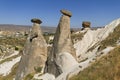 Volcanic rock formations known as fairy chimneys in Urgup and extreme terrain of Cappadocia, Turkey Royalty Free Stock Photo