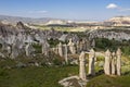 Extreme terrain of Cappadocia and volcanic rock formations known as fairy chimneys, Turkey Royalty Free Stock Photo