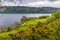 A view over the hedgerows towards Loch Ness and Urquhart Castle, Scotland Royalty Free Stock Photo