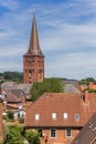 View over historic city and church tower in Plon