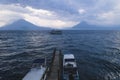 View Over Lake Atitlan To The Volcanoes During Sunset With Tour Boat At Panajachel, Guatemala