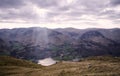 Sunlight over Mountains and Lake Royalty Free Stock Photo