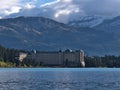 View over Lake Louise in the morning with hotel on the shore in front of the Rocky Mountains in Banff National Park, Canada. Royalty Free Stock Photo