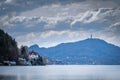 View over lake WÃÂ¶rthersee through Maiernigg to mountain tower Pyramidenkogel Royalty Free Stock Photo