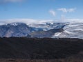 View over a landscape of Godland and thorsmork with the Eyjafjallajokull glacier and volcano, lava formations, snow, ice