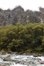 View over Makarora River on opposite forest and mountains