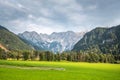 View over meadow in Zgornje Jezersko, to Kamnik-Savinja Alps Royalty Free Stock Photo