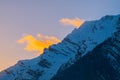 View over mountain Grimming to some yellow clouds on sunset