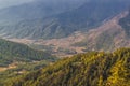 View over the mountains in Bhutan on the way to Taktshang GoembaTiger`s Nest Monastery, the most famous Monastery in Bhutan, in Royalty Free Stock Photo