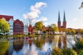View over the Muehlenteich pond to the buildings and Cathedral of Luebeck at the Baltic Sea, Schleswig-Holstein