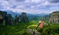 View over nunnery of Moni Agias Varvaras Roussanou, rocks of Meteora, Greece and valley. UNESCO World Heritage. Cloudy Royalty Free Stock Photo