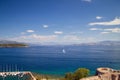 View over the picturesque bay of Corfu Gouvia with light feather clouds, blue sky and water Royalty Free Stock Photo