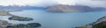 View over Queenstown Bay and Cecil Peak under cloudy skies in the South Island of New Zealand Royalty Free Stock Photo