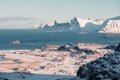View over Ramberg from hike to Ryten. Winter in Lofoten islands from different places. Village next to the beach and mountains in Royalty Free Stock Photo