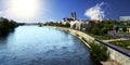 View over the river Elbe in Magdeburg, Germany, looking at a church and the medieval cathedral in the background