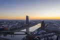 View over river Main in Frankfurt with Floesser Bridge and European Central Bank building with sun reflection in the Royalty Free Stock Photo
