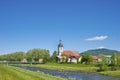 View over the river Murg on the parish church Saint Laurentius