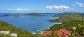 A view over the roof tops of Tortola towards the islands of Guana, Great Camanoe and Scrub Royalty Free Stock Photo