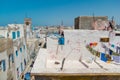 View over the roofs of houses with different clothes after washing in the old arabic town of Essaouira Royalty Free Stock Photo