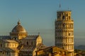 A view over the rooftops of Pisa towards the Cathedral Square, featuring the Cathedral, the Tower & the Baptistry, taken just afte Royalty Free Stock Photo