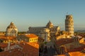 A view over the rooftops of Pisa towards the Cathedral Square, featuring the Cathedral, the Tower & the Baptistry, taken just afte Royalty Free Stock Photo