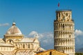 A view over the rooftops of Pisa towards the Cathedral Square, featuring the Cathedral, the Tower & the Baptistry, taken just afte Royalty Free Stock Photo