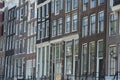 View over row of houses by the canal in typical Dutch style in Amsterdam Royalty Free Stock Photo