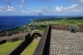 A view over St. Kitts and Sint Eustatius Islands with Brimstone Hill Fortress fortifications on the foreground on a bright sunny Royalty Free Stock Photo