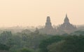 View over ancient temples of Bagan complex during sunrise golden hour in Myanmar Royalty Free Stock Photo