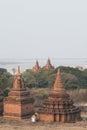 View over stupas and pagodas of ancient Bagan temple complex during sunrise in Myanmar Royalty Free Stock Photo