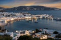 View over the town and old harbour of Mykonos during sunset Royalty Free Stock Photo