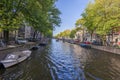 View over a typical canal in the Dutch metropolis Amsterdam in summer 2023