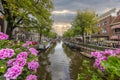 View over a typical canal in the Dutch metropolis Amsterdam in summer 2023