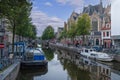 View over a typical canal in the Dutch metropolis Amsterdam in summer 2023