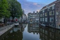 View over a typical canal in the Dutch metropolis Amsterdam in summer 2023
