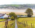 A view over the village of Llansteffan, Wales across the river Towy towards Ferryside Royalty Free Stock Photo