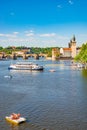 View over Vltava river with Charles Bridge and walking embarkment in historical downtown of Prague, Czech Republic, with many tour Royalty Free Stock Photo