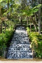 View over a waterfall in stairs, water curtain, in the middle of beautiful tropical nature