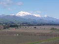 View over wineries with mountain range in background Royalty Free Stock Photo