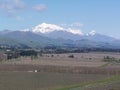 View over wineries with mountain range in background