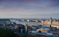 A view overlooking the city of Hungarian Parliament Building and Budapest and the River Danube at pink sunset, Hungary, Europe. Royalty Free Stock Photo