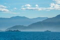 View of Padang coast with several navy ships anchor near the coast