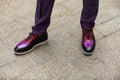 View of a pair of purple sneakers shoes