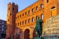 Palatine Gate with a statue Roman Era, in Turin Royalty Free Stock Photo