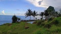 View of Pangasan Beach in Pacitan, East Java, Indonesia with beautiful and exotic views of rice fields and hills Royalty Free Stock Photo