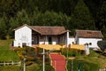 View of the Pantano de Vargas Historical House Museum located in Paipa in front of the Lancers memorial sculptural complex Royalty Free Stock Photo