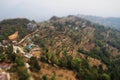 View from a paraglider to the valley and Lake Pheva in Pokhara, Himalayas. Rice fields, mountains and small houses. Tilt Shift Eff