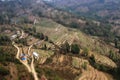 View from a paraglider to the valley and Lake Pheva in Pokhara, Himalayas. Rice fields, mountains and small houses. Tilt Shift Eff