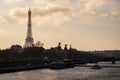 View of Paris at sunset with the Eiffel Tower and the bridge Alexander III Royalty Free Stock Photo